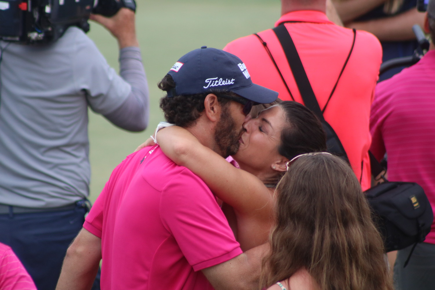 Paul Tesori kisses his wife Michelle after the victory.
